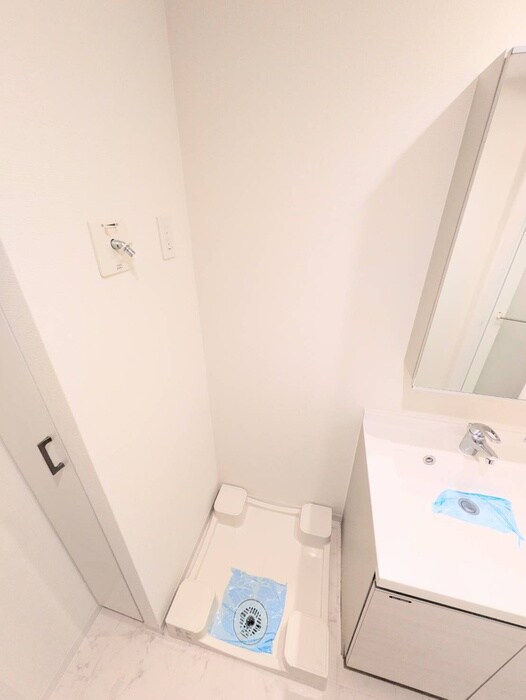 物件内観写真12　(洗濯機置場)