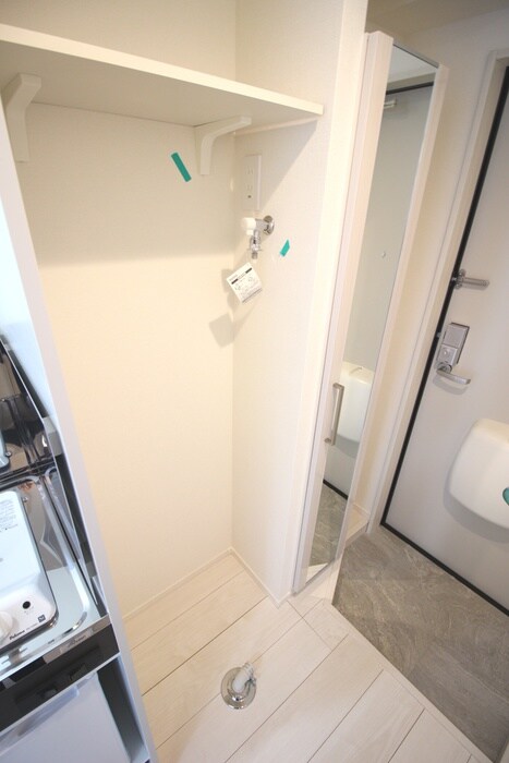 物件内観写真11　(洗濯機置場)