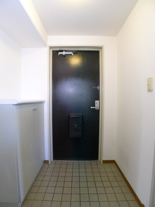 サンパセオ新柏E号棟（806）の玄関