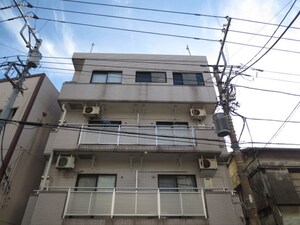 ベイフラットホンモク外観写真