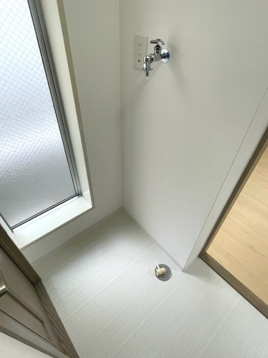 物件内観写真11　(洗濯機置場)