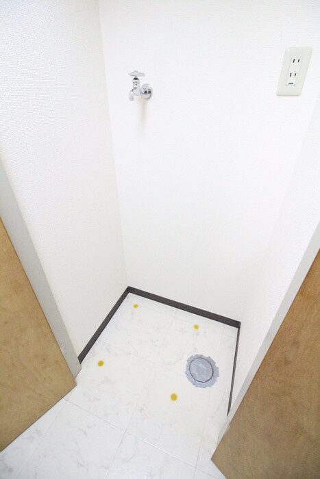 物件内観写真11　(洗濯機置場)