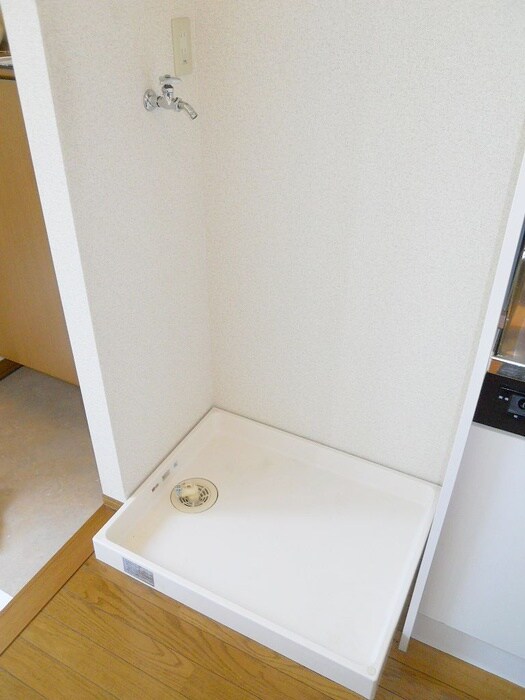 物件内観写真11　(洗濯機置場)