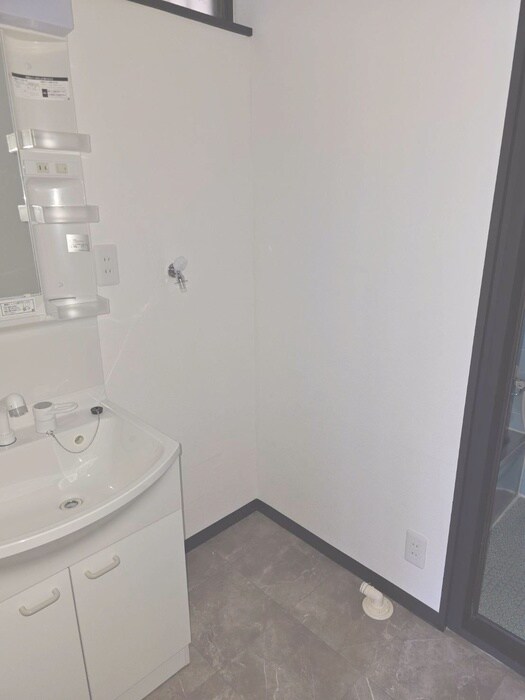 物件内観写真12　(洗濯機置場)