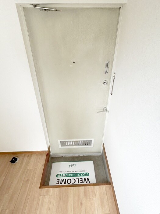 ホワイトコ－トの玄関