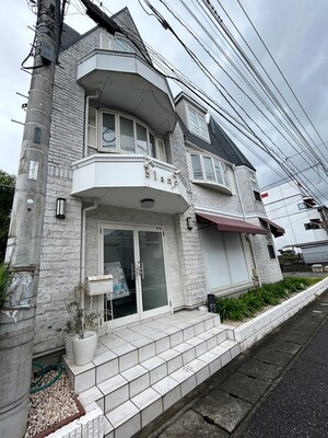 王方南越谷店舗外観写真