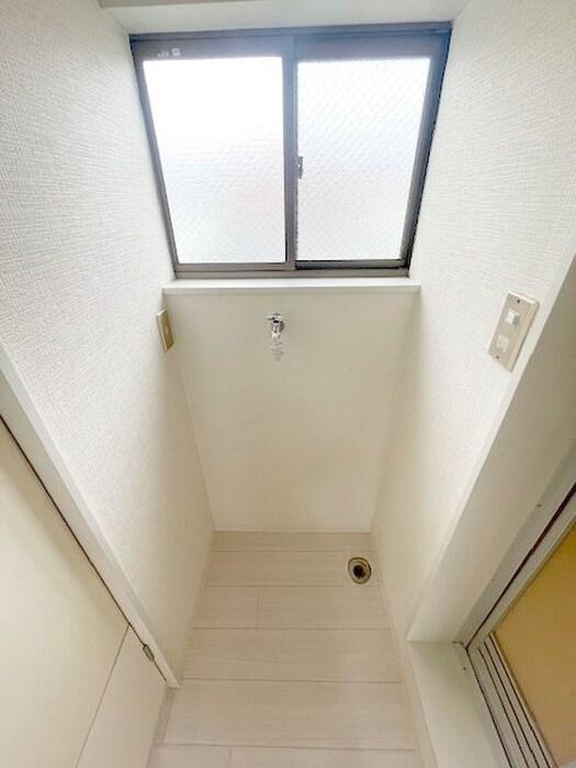 物件内観写真11　(洗濯機置場)