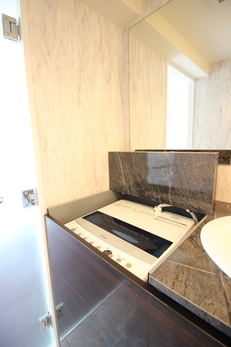 物件内観写真12　(洗濯機置場)