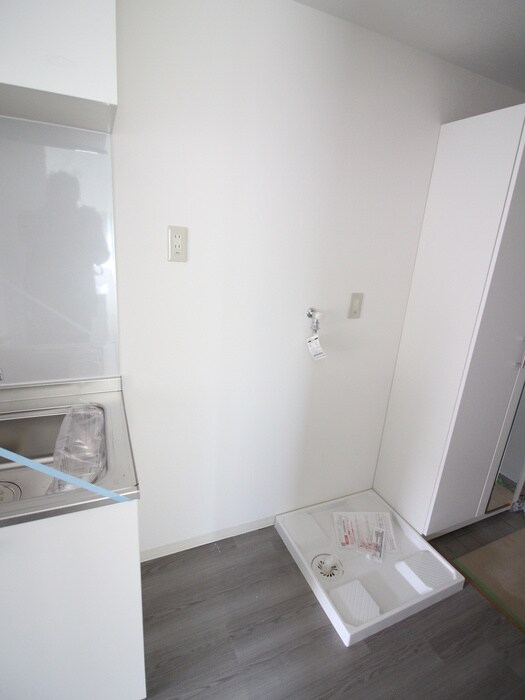 物件内観写真11　(洗濯機置場)