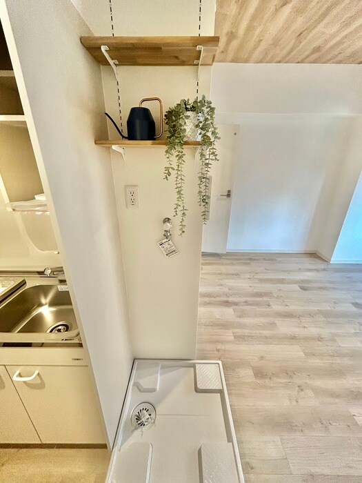 物件内観写真11　(洗濯機置場)