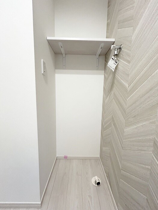 物件内観写真11　(洗濯機置場)