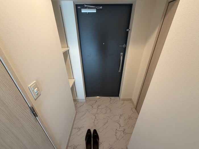 ｺﾝﾌｫﾘｱ・ﾘｳﾞ豊洲ｷｬﾅﾙの玄関