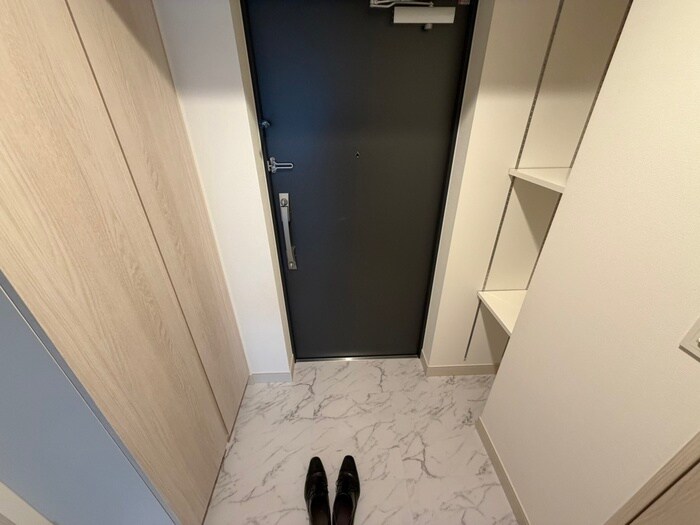 ｺﾝﾌｫﾘｱ・ﾘｳﾞ豊洲ｷｬﾅﾙの玄関