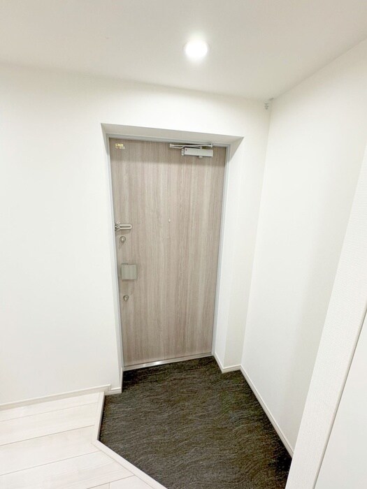 レオーネ志村坂上の玄関