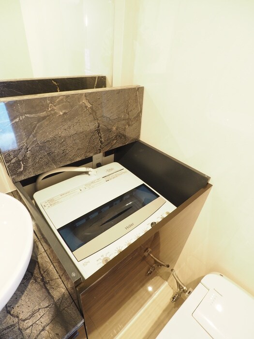 物件内観写真11　(洗濯機置場)