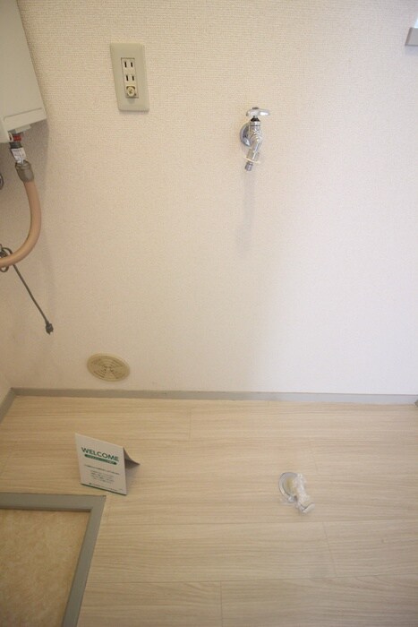 物件内観写真11　(洗濯機置場)