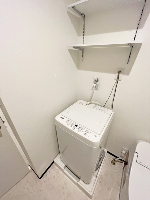 物件内観写真11　(洗濯機置場)