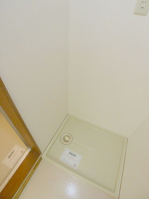 物件内観写真11　(洗濯機置場)