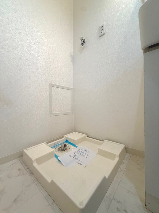 物件内観写真15　(洗濯機置場)