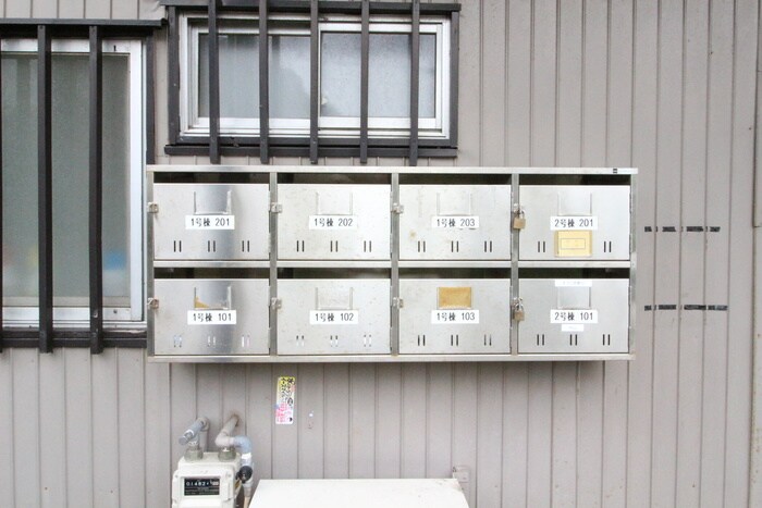 物件外観写真4　(バイク置き場)