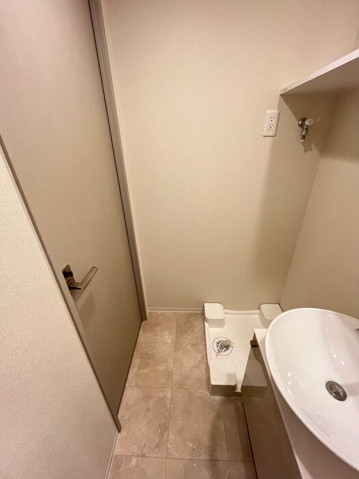 物件内観写真11　(洗濯機置場)