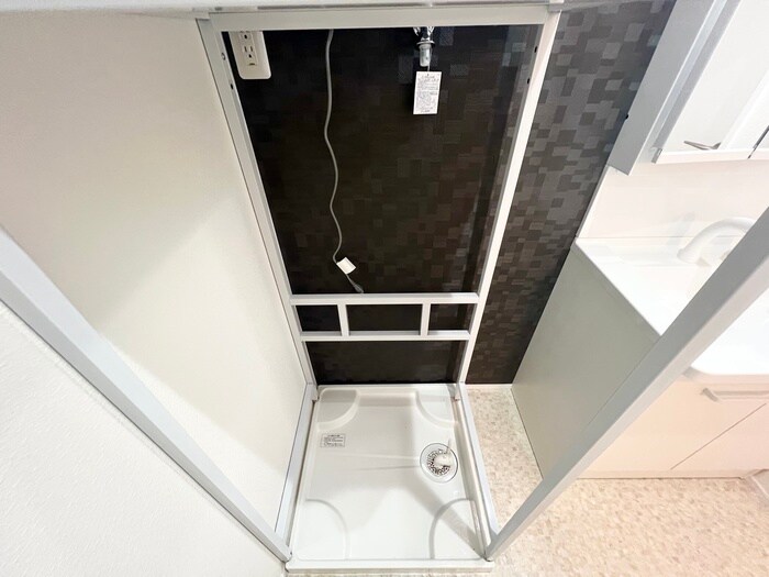 物件内観写真11　(洗濯機置場)