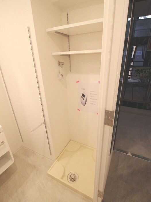 物件内観写真11　(洗濯機置場)