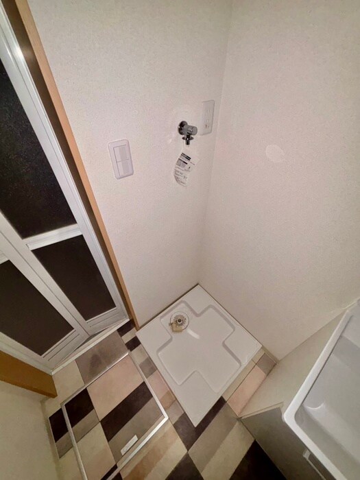 物件内観写真11　(洗濯機置場)