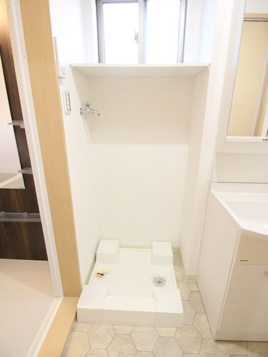 物件内観写真11　(洗濯機置場)