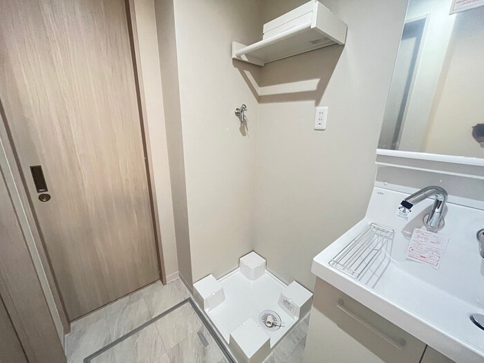 物件内観写真11　(洗濯機置場)