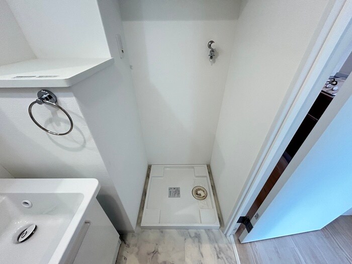 物件内観写真11　(洗濯機置場)