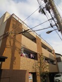 トミ－四番館