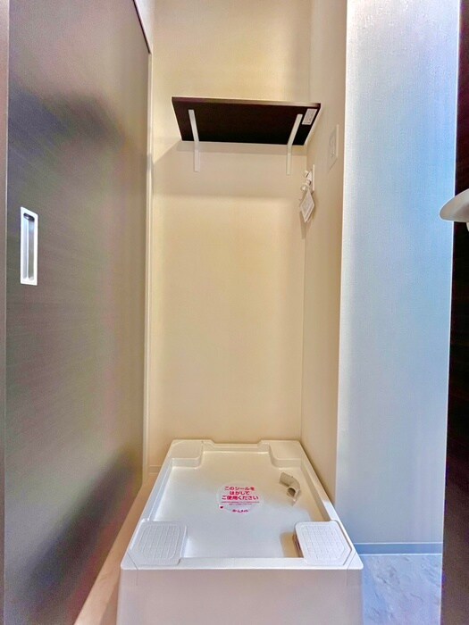 物件内観写真11　(洗濯機置場)