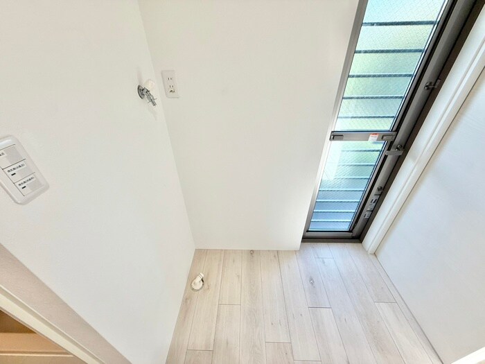 物件内観写真12　(洗濯機置場)