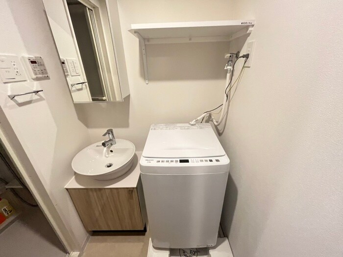 物件内観写真12　(洗濯機置場)