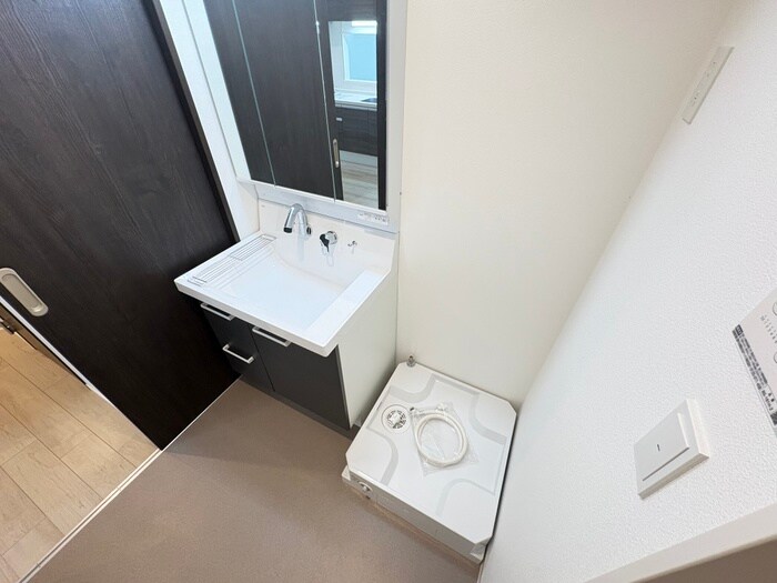 物件内観写真11　(洗濯機置場)