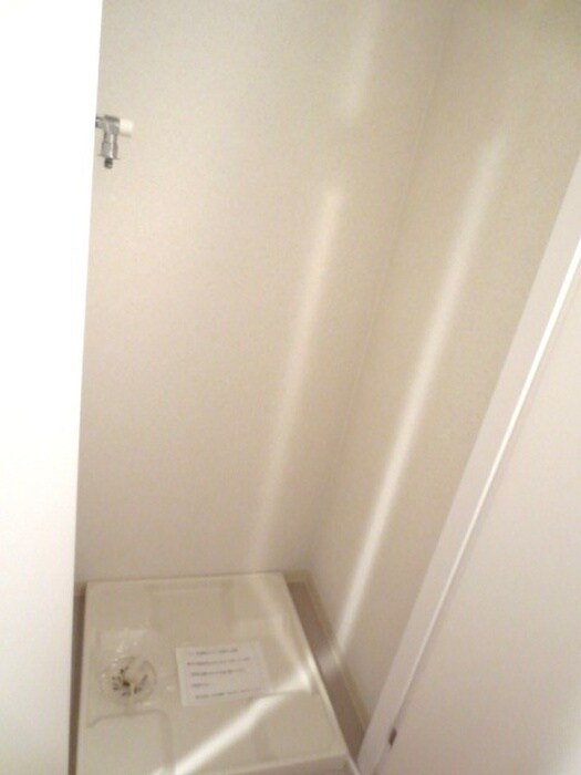 物件内観写真11　(洗濯機置場)