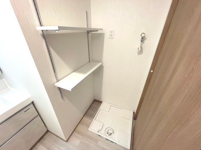 物件内観写真11　(洗濯機置場)