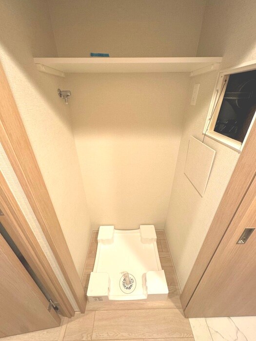 物件内観写真11　(洗濯機置場)