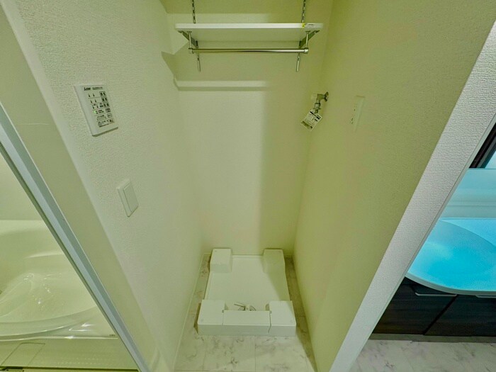 物件内観写真11　(洗濯機置場)