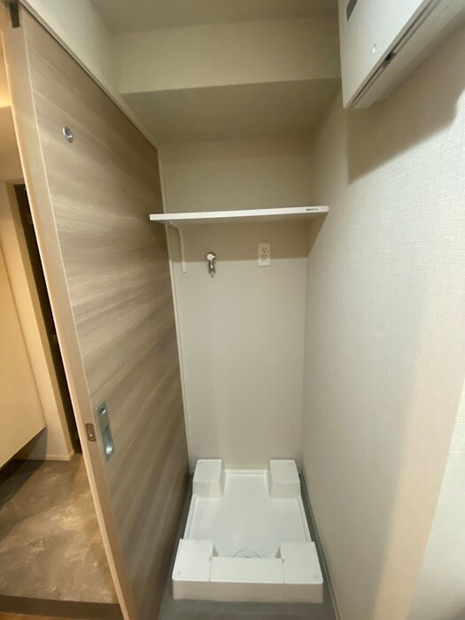 物件内観写真11　(洗濯機置場)