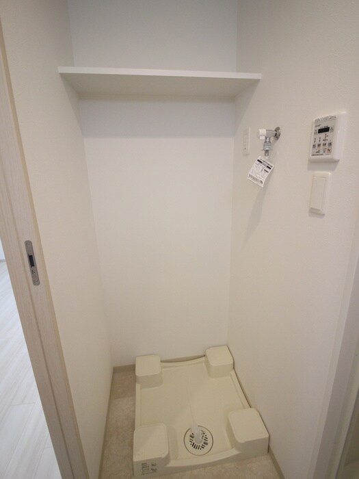 物件内観写真11　(洗濯機置場)