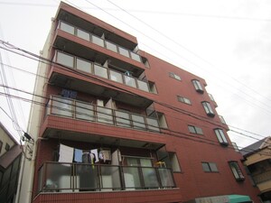 豊里丸富マンション外観写真