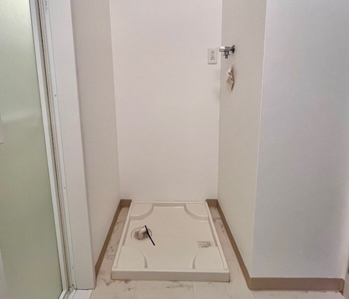 物件内観写真11　(洗濯機置場)