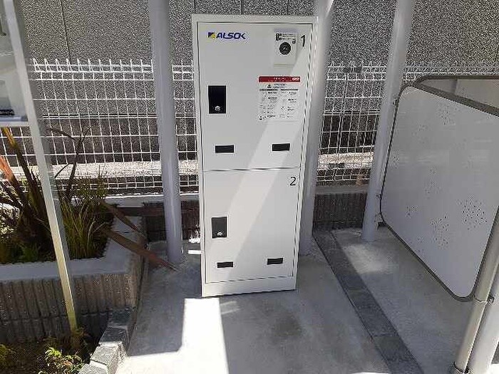 物件外観写真2　(バイク置き場)