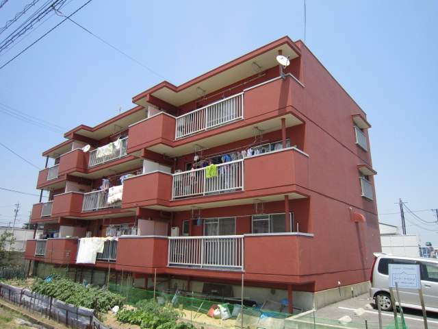 コ－ト・トミシン