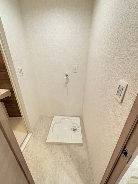 物件内観写真11　(洗濯機置場)