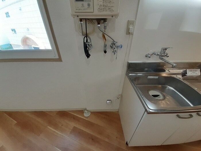 物件内観写真16　(洗濯機置場)