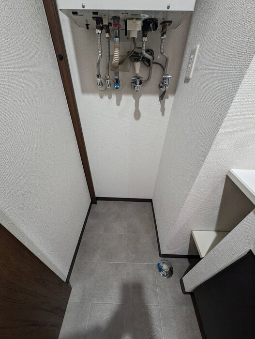 物件内観写真12　(洗濯機置場)