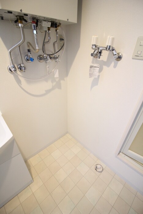 物件内観写真12　(洗濯機置場)